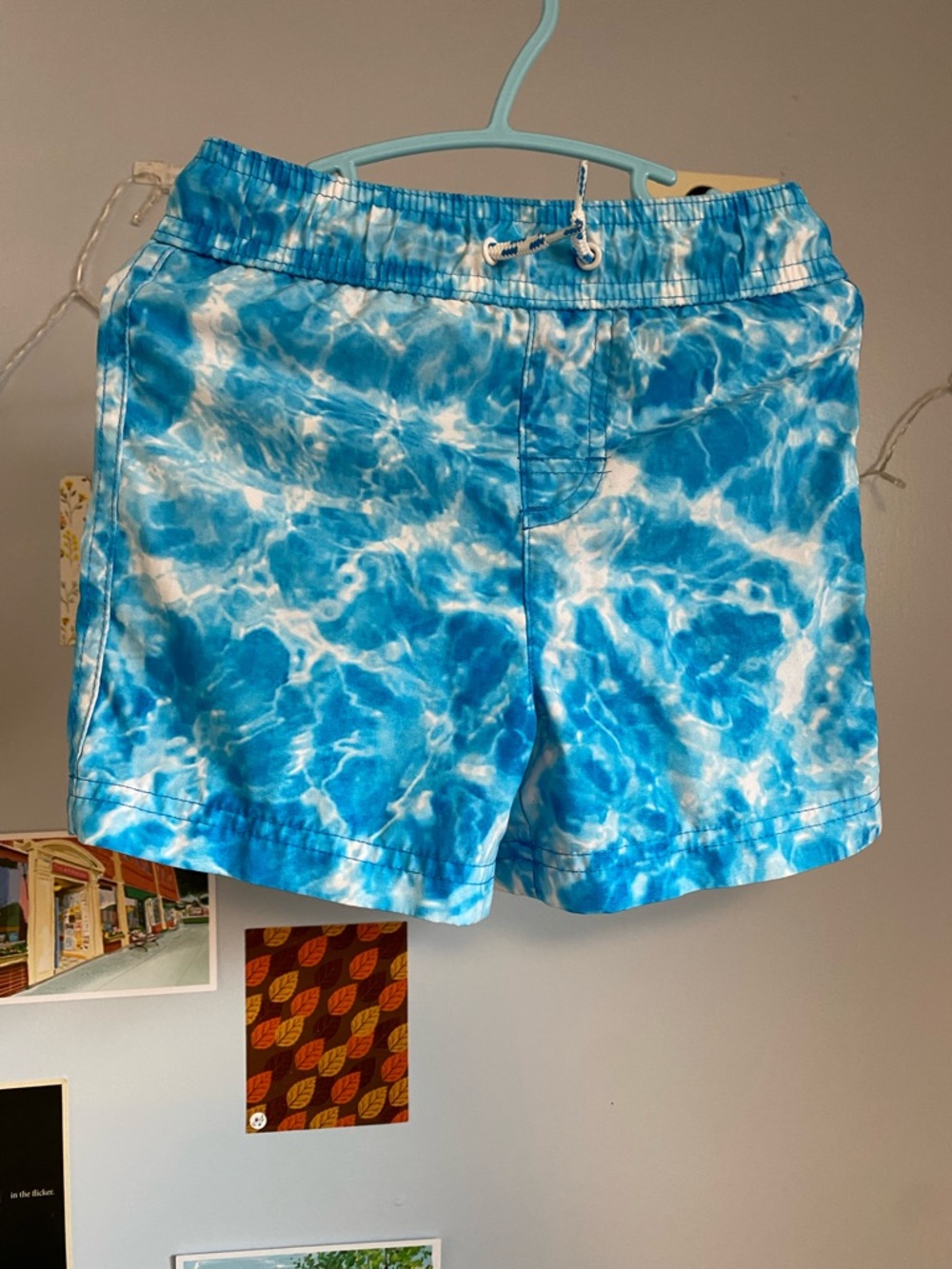Blue Waterprint Swim Shorts and hat